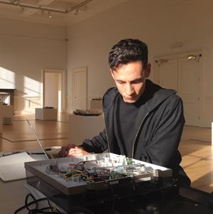 Brian Castriota documenting artist-modified turntables for an installation art work at the Scottish National Gallery of Modern Art