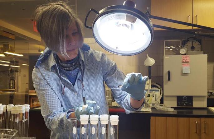 Smithsonian American Art Museum Objects Conservator Helen Ingalls performing Oddy testing. Photo courtesy SAAM.